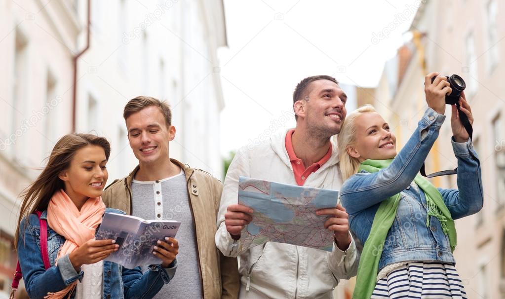 depositphotos 50372267 stock photo group of friends with city